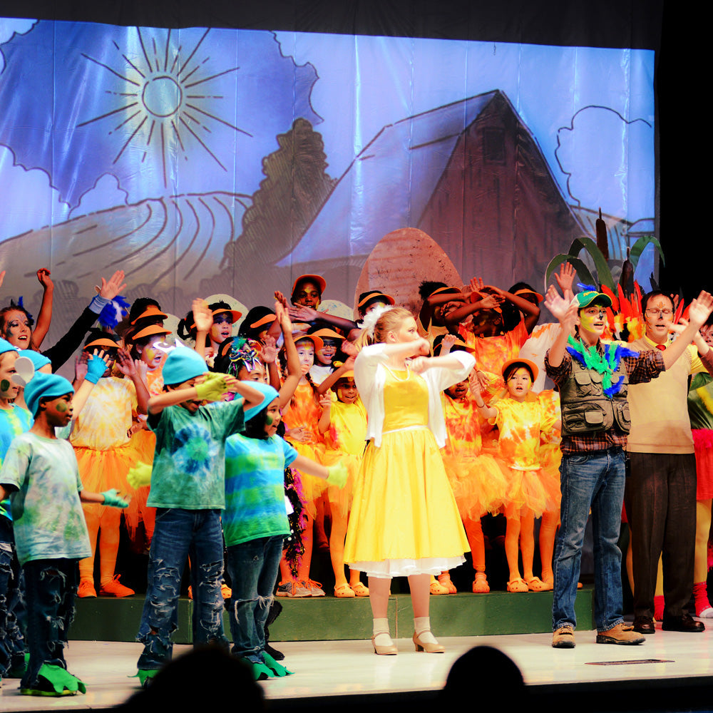 HONK cast in front of digital projection backdrops