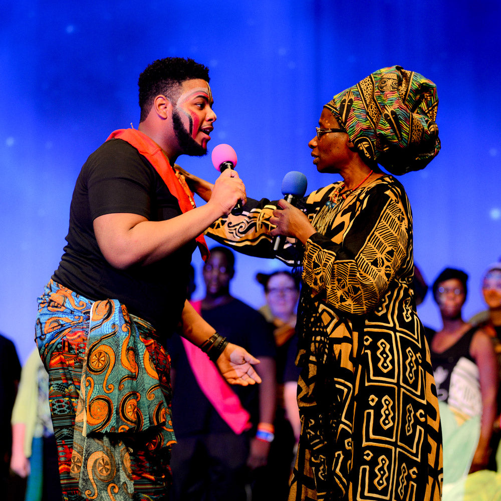 Community production of Lion King with digital projection backdrops