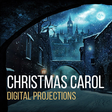 Moonlit Victorian London street with snowfall and arches—digital projection backdrop designed for A Christmas Carol stage productions.