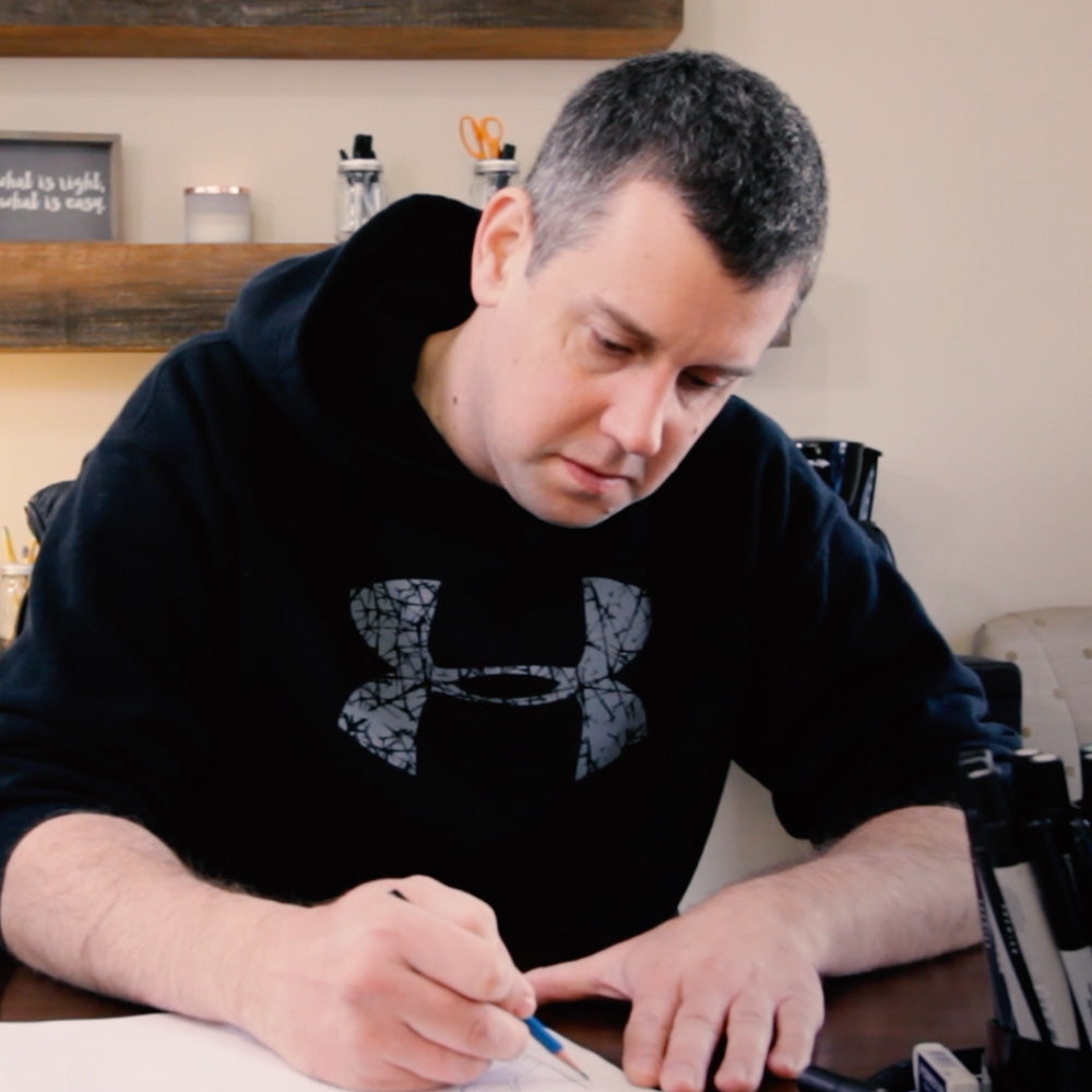 Theatre projection designer Mitch Stark drawing at Theatre Avenue